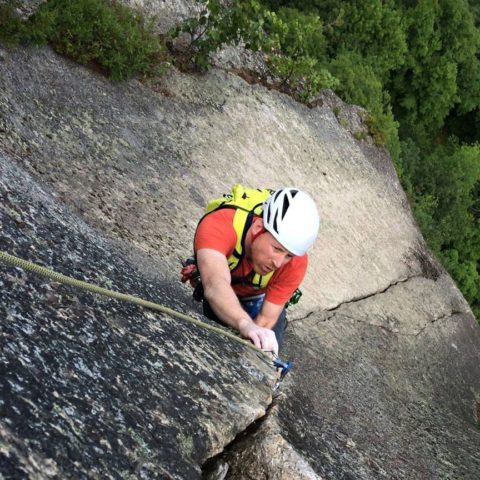 Advanced rock climbing guiding and instruction on the upper pitch of The Prow on Cathedral Ledge, New Hampshire.