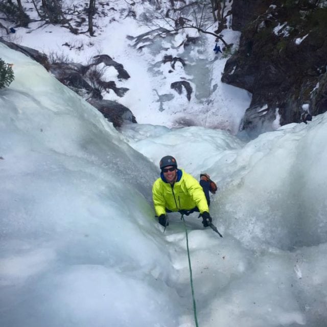 Guided ice climbing on Dracula at Frankenstein Cliffs in Crawford Notch, New Hampshire.
